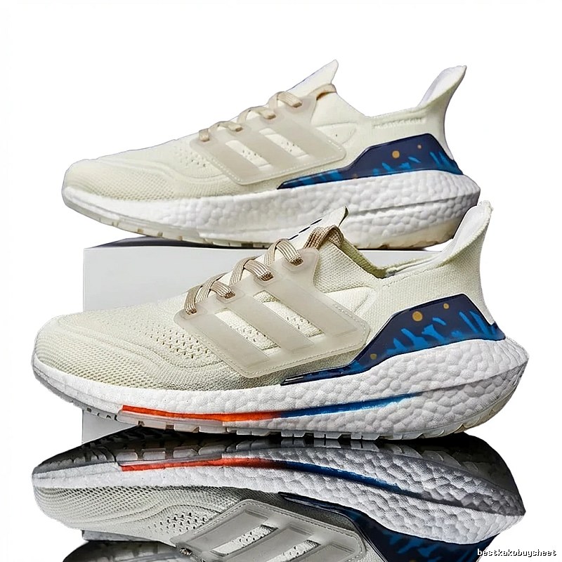 Adidas retro-style white and blue sports shoes