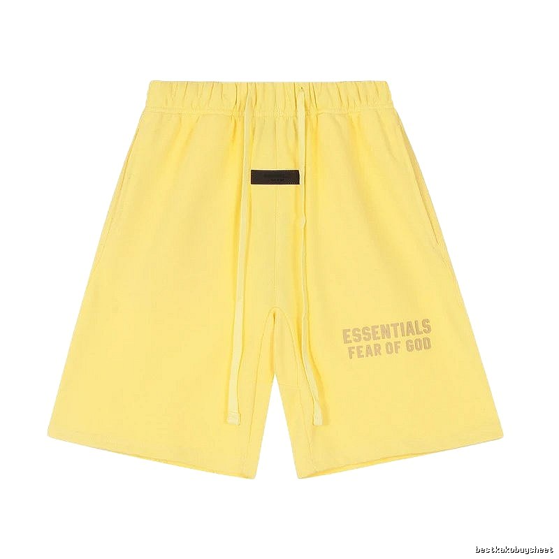 ESSENTIALS minimalist style yellow shorts