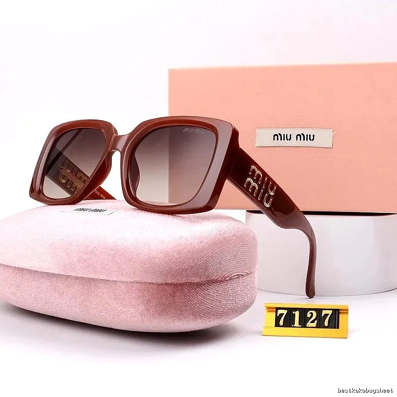 Miu Miu Summer Oversized sunglasses Black Oval Sunglasses with Bold Graphic