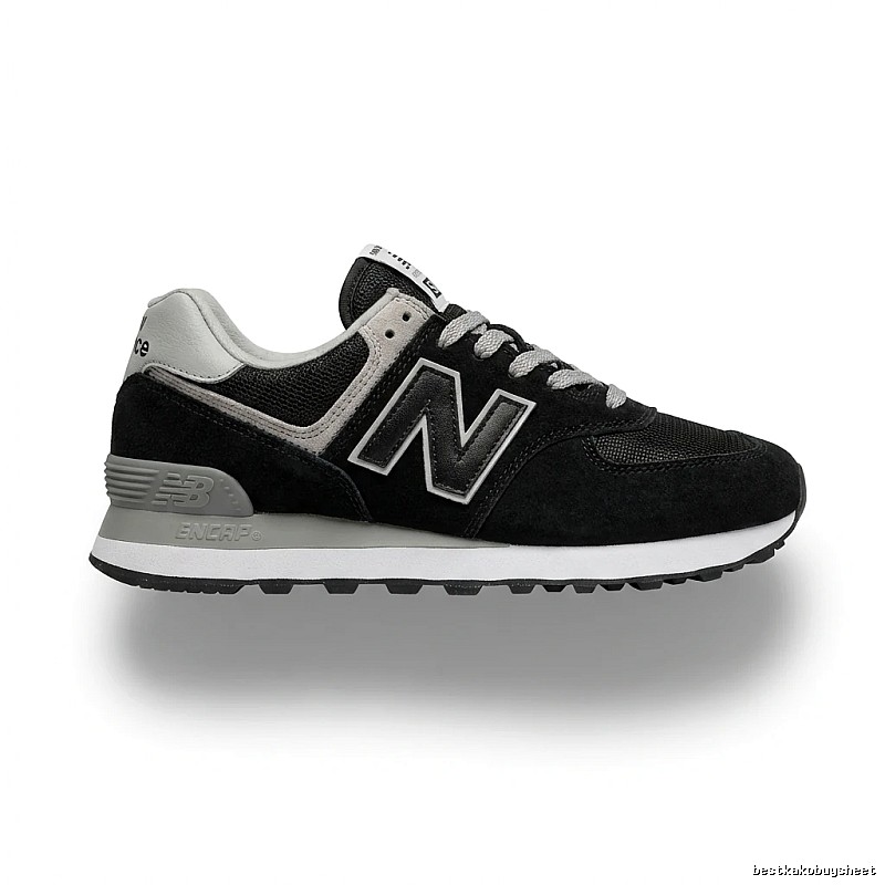 New Balance retro-style black and grey sports shoes